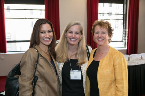 Nicole, Maggie and Mary posing for photo.